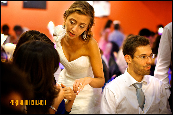 Bride chats with guests at the table in the Medical Association's party room.