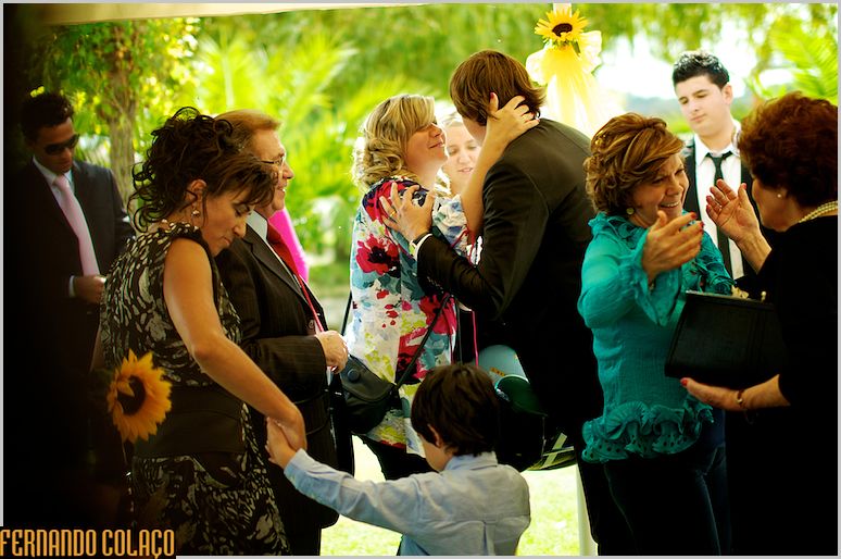 Guests celebrate at the end of the wedding ceremony at Quinta das Riscas.