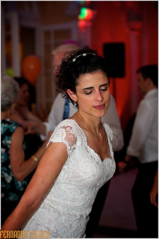 The bride dances at her wedding party.