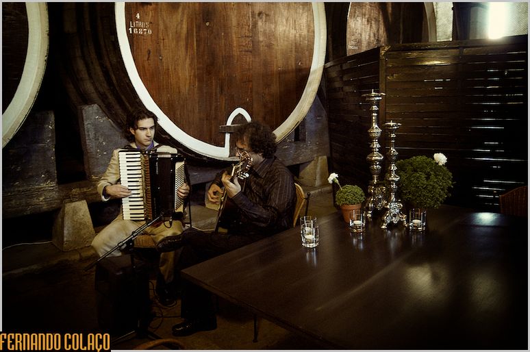 A guitarist and an accordionist liven up the wedding ceremony venue.