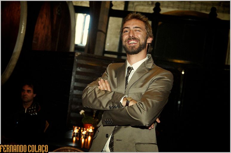 The groom, laughing a lot, waits for the bride for the wedding ceremony at Adega Regional de Colares.