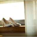 Bride's shoes on the windowsill.Bride's shoes on the windowsill.