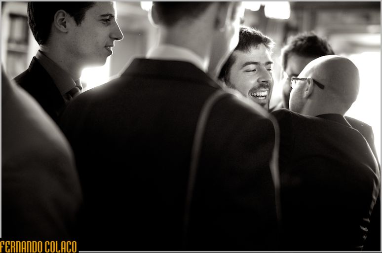 Groom, in the midst of friends who congratulate him on his marriage.