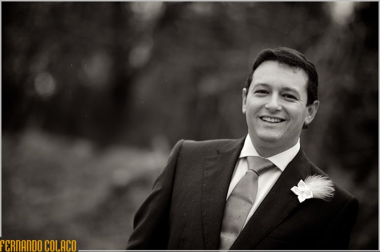Portrait of the smiling groom.