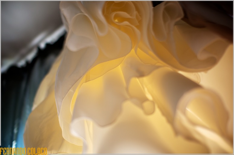 Ruffles of the bride's dress, seen from below.