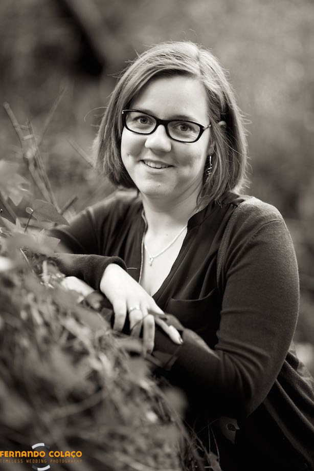 Black and white portrait of the bride, on the plants of a wall in the Sintra mountain range, in the dating session with the wedding photographer.