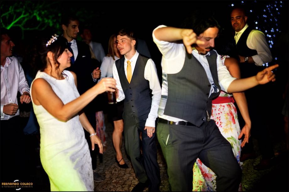 Wedding guests dancing the night away at the wedding party at Morada do Sol in Sintra.