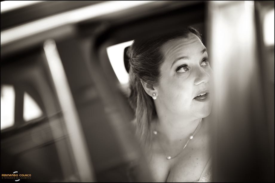 Bride seems to ask something as she gets into the car.