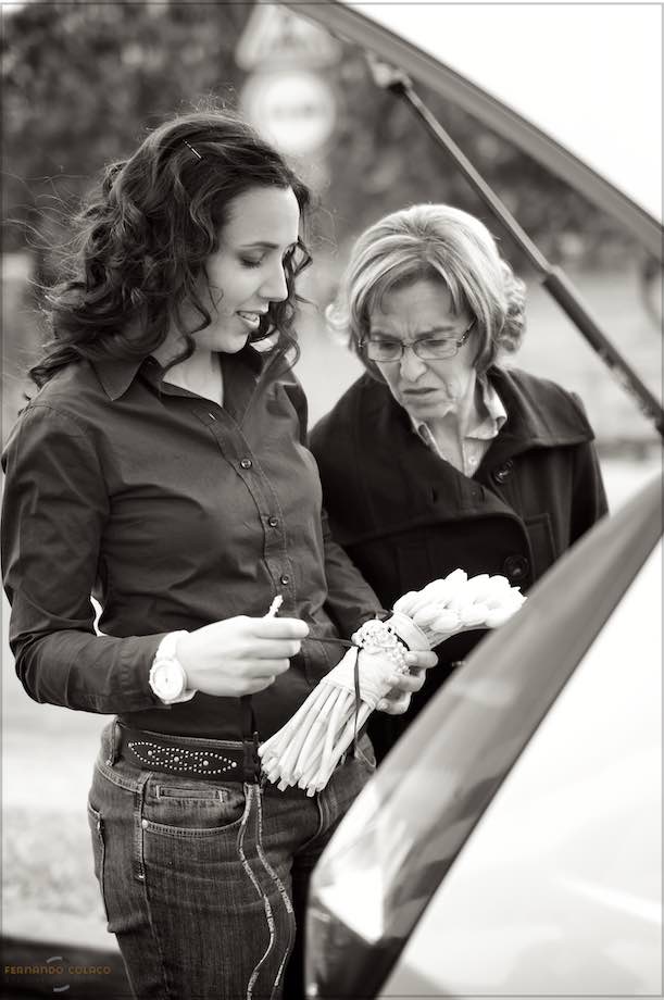 The bride, with her mother, when she arrives at the hairdresser, for the wedding hairstyle.