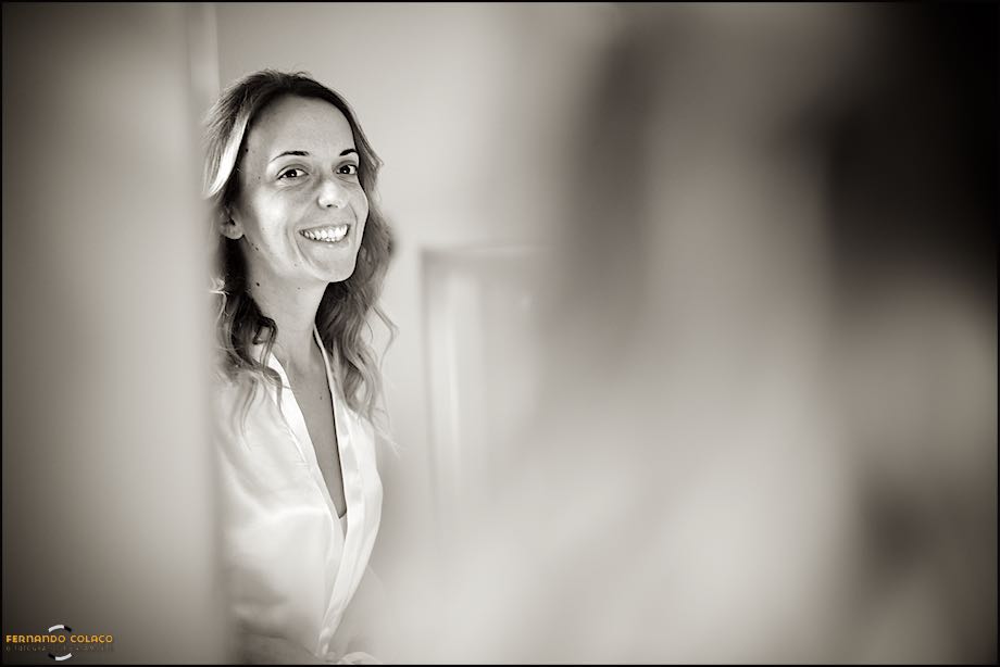 Half bodied bride, between out of focus, and laughing.