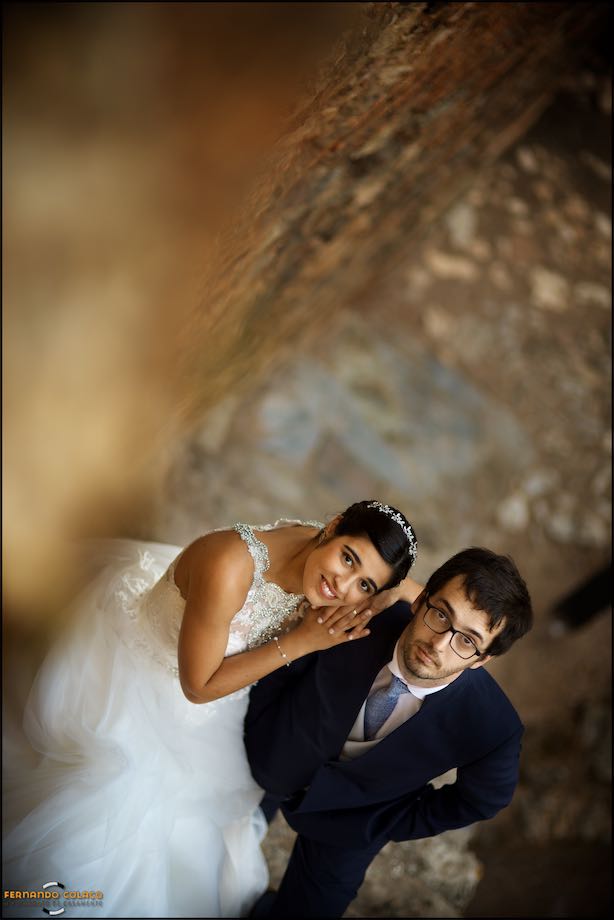 On the stairs of Castelo do Alandroal, the groom and the bride.