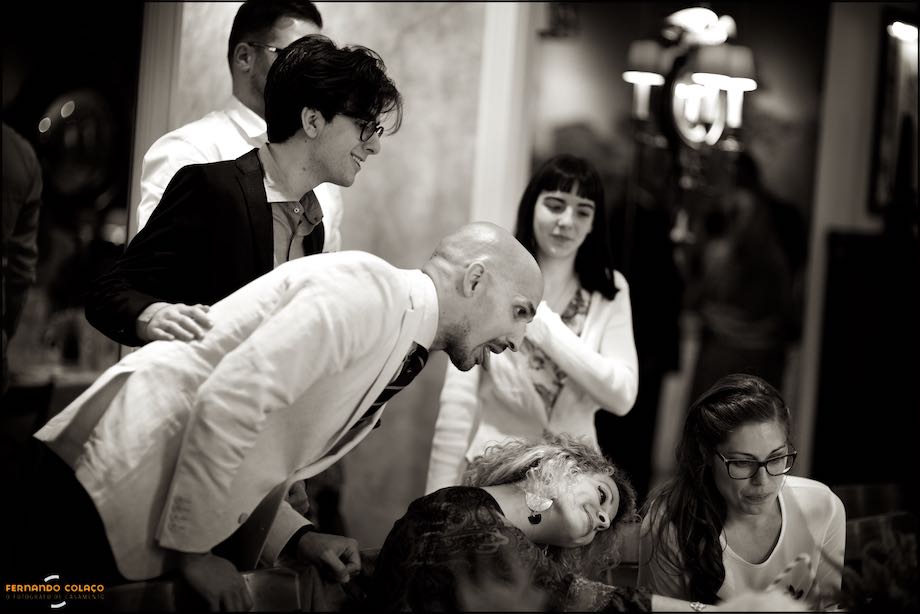 Group of wedding guests make faces during the party.
