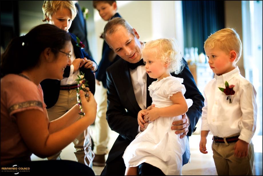 A loving father helping his children, for his wedding ceremony.