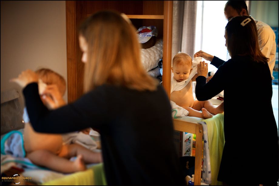 Dressing the baby for the christening.