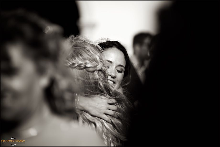 Bride wrapped in guests after the ceremony.