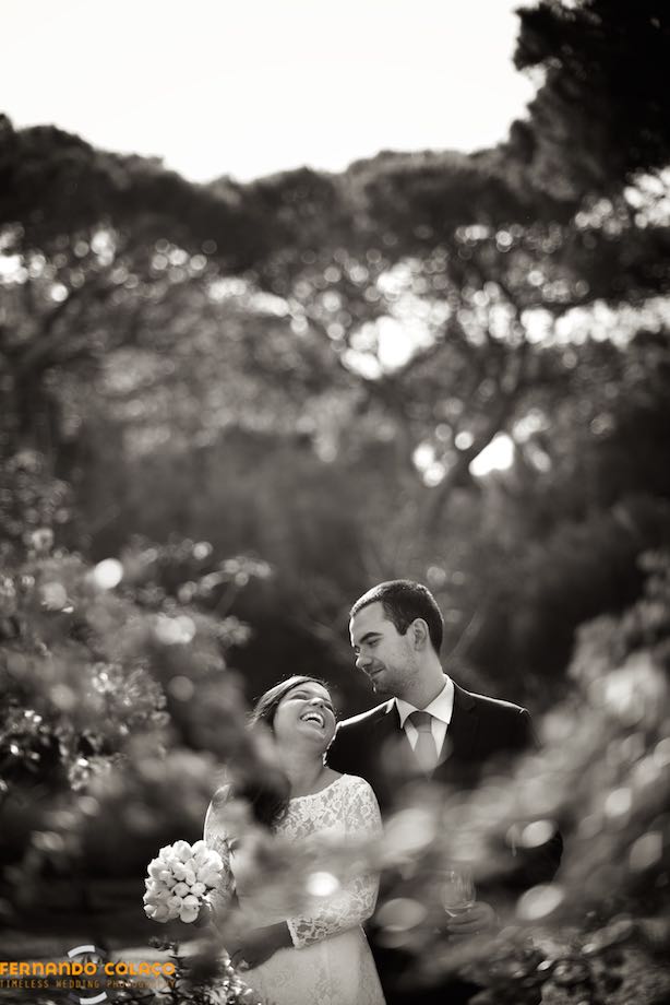Bride laughing at the groom at the session with the wedding photographer.